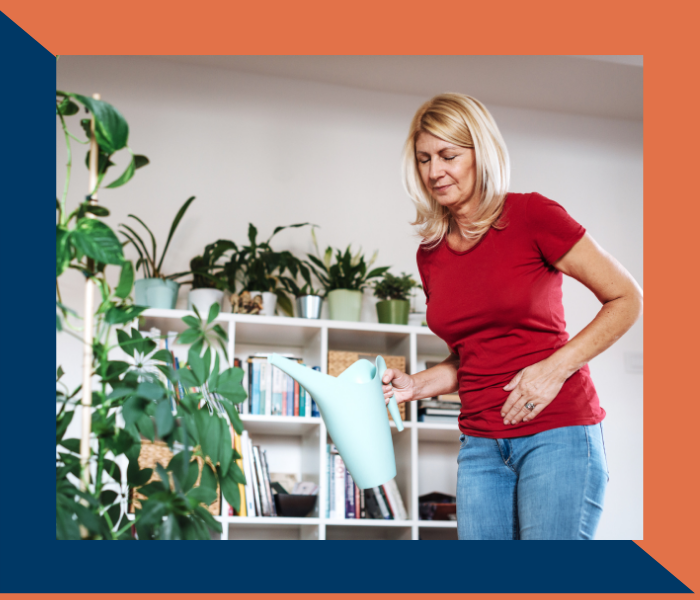 woman watering her plant